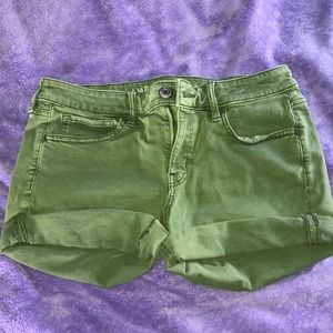 green jean shorts